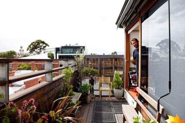 Your balcony only dry clothes, but his balcony is beautiful like a garden!